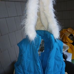 Girls 5/6 puffy vest with hood. Never worn
